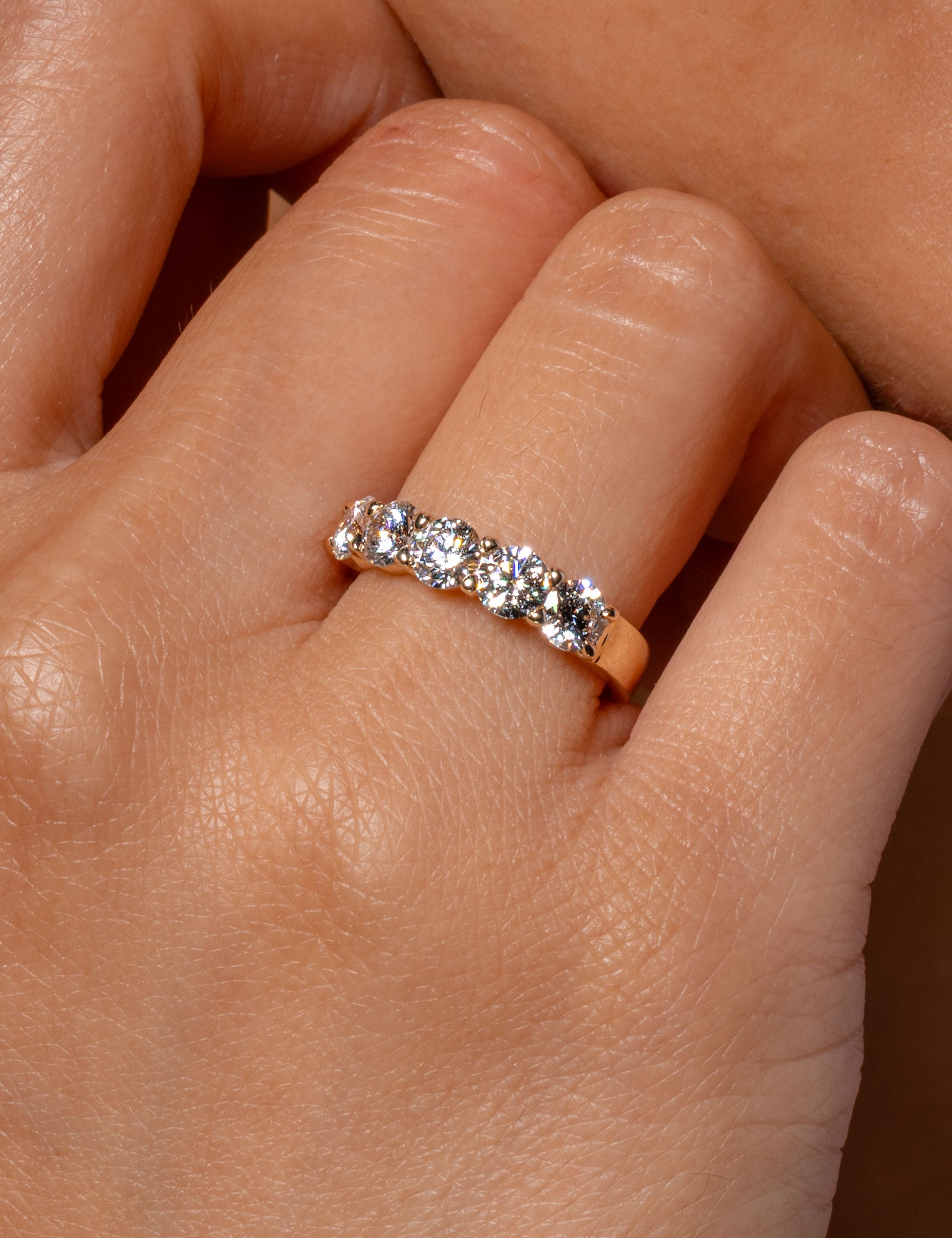 5-stone-ring-yellow-close.jpg