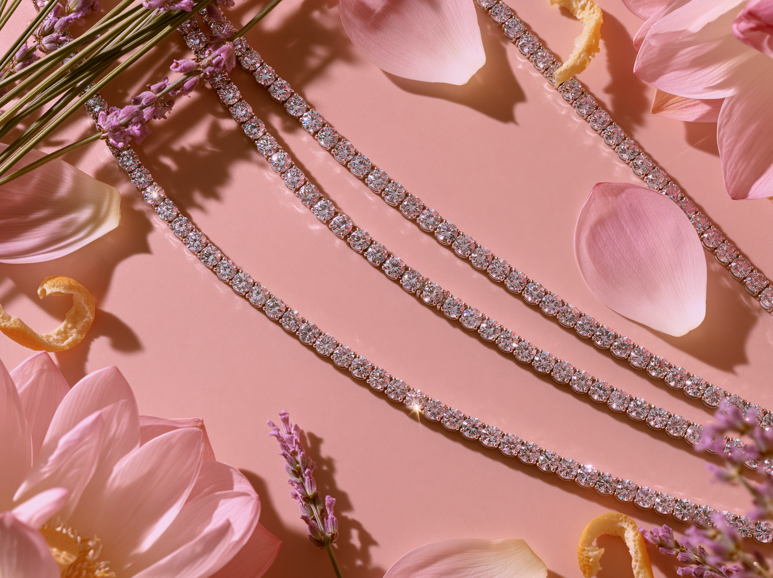 Diamond bracelets on a pink floral background