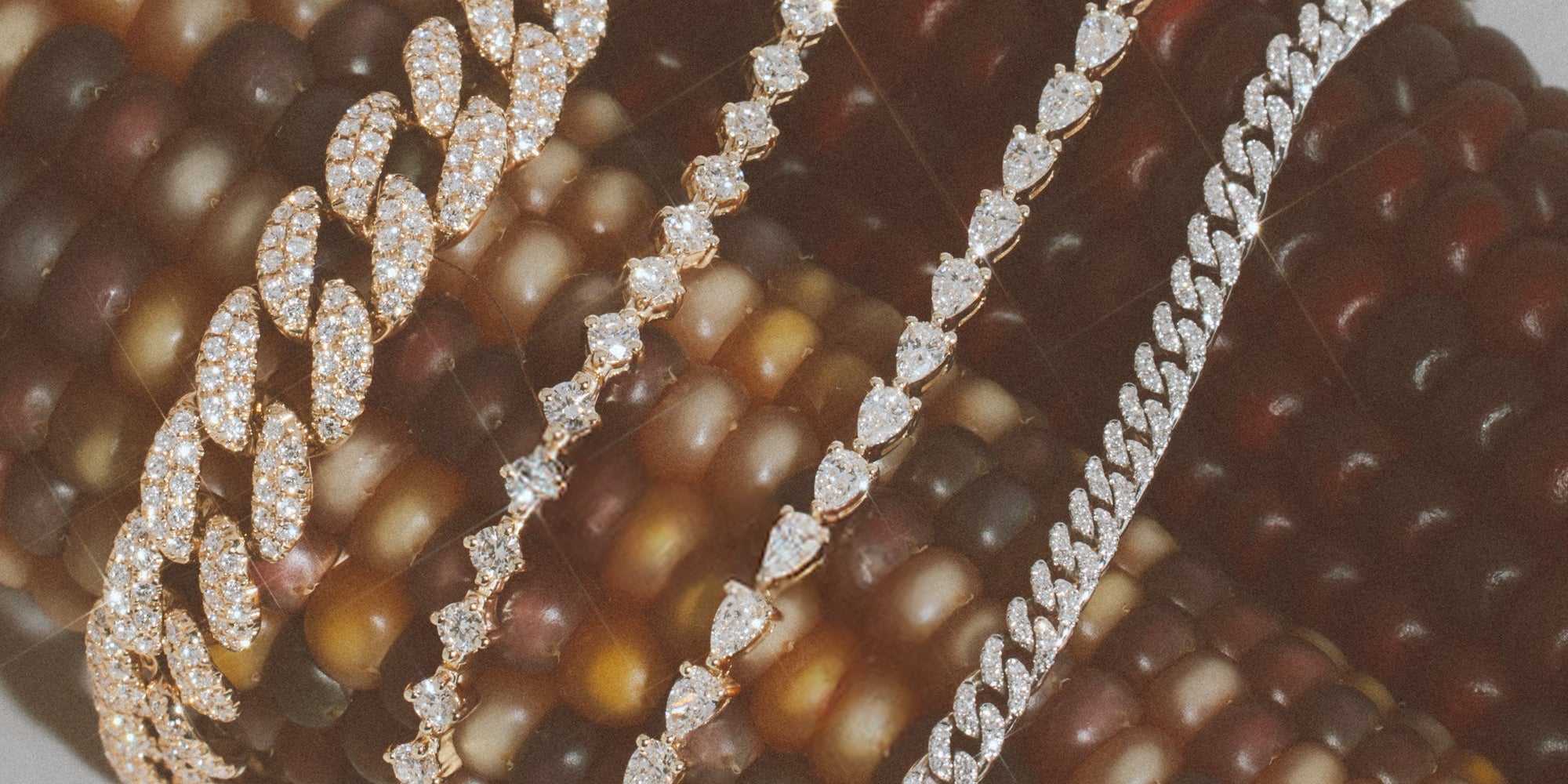 Diamond bracelets on a pink floral background