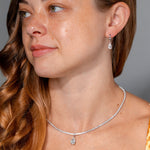 1.94ct D-VS1 Lab Diamond Pear Drop Hoops White Gold high polish with seamless snap closure at princess bride diamonds in huntington beach california on model  