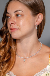 1.94ct D-VS1 Lab Diamond Pear Drop Hoops White Gold high polish with seamless snap closure at princess bride diamonds in huntington beach california on model  