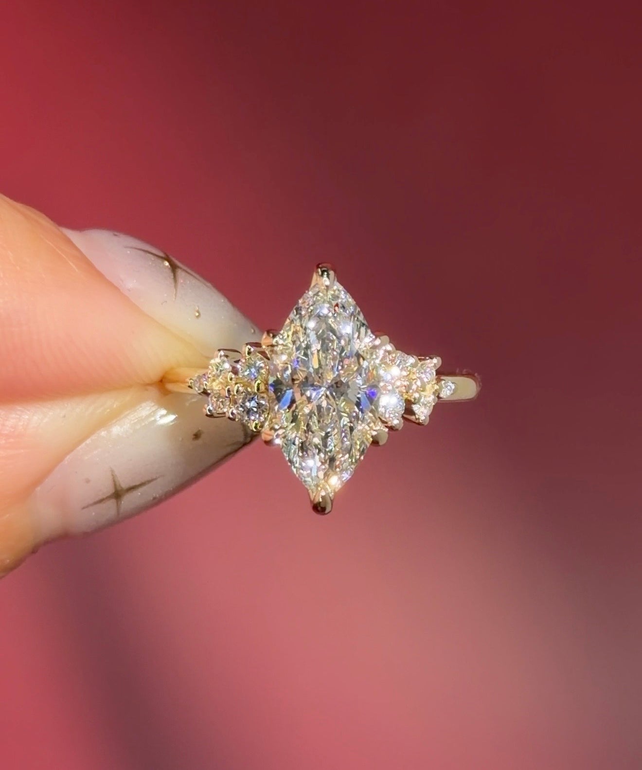 marquise lab diamond yellow gold engagement ring side stone cluster nature inspired