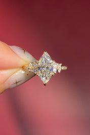 marquise lab diamond yellow gold engagement ring side stone cluster nature inspired