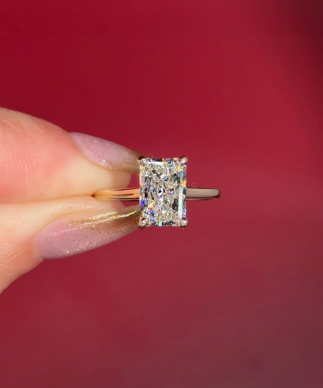 2.50ct D-VS1 Radiant Lab Diamond Alice. The Alice features a classic high polish band with a hidden inner under halo and cathedral-style body with a diamond bridge.