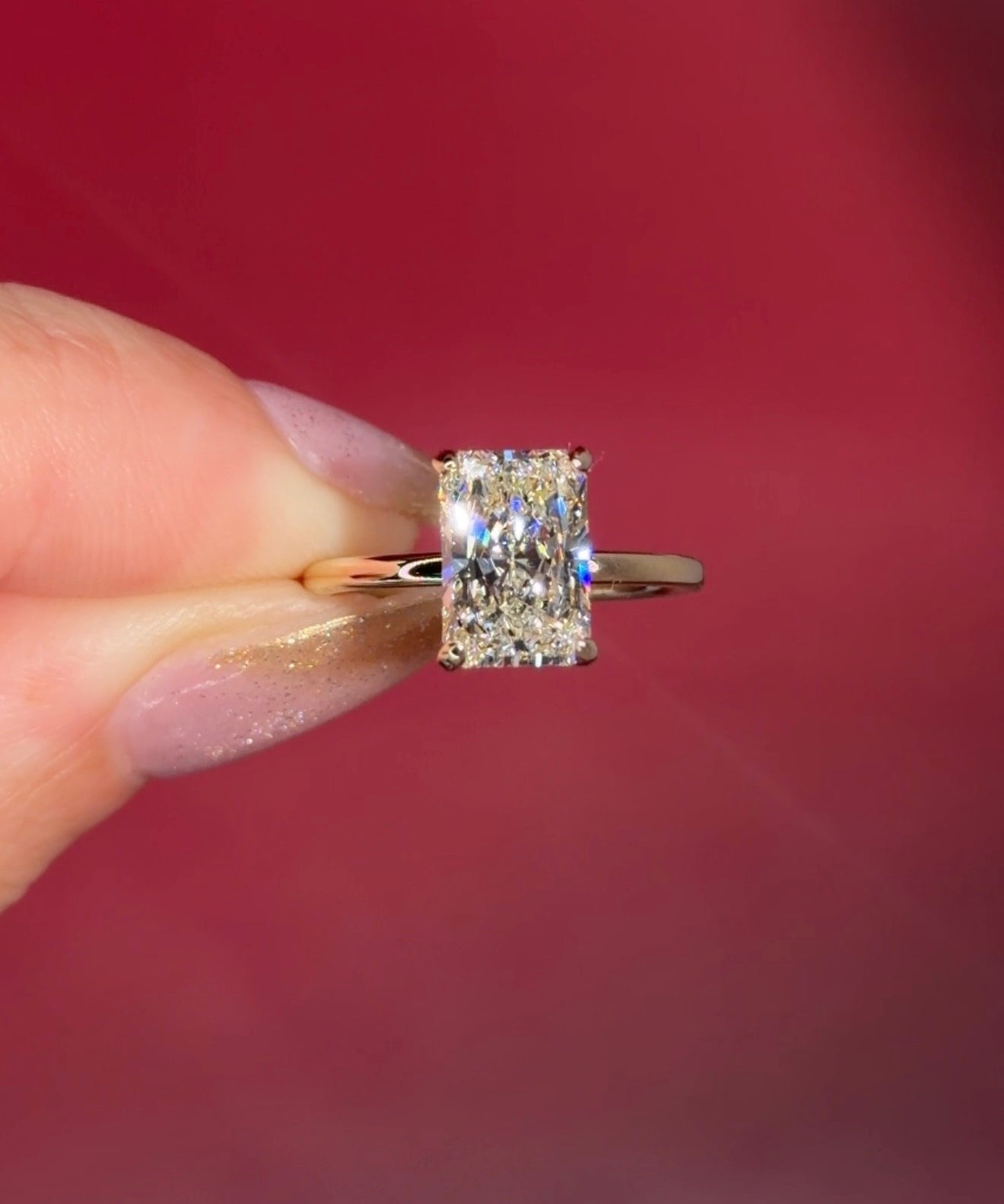 2.54ct F-VS1 Radiant Lab Diamond Leah. Simple and low maintenance, the Leah is a timeless solitaire designed for everyday wear. Crafted in solid 14k yellow gold, this traditional style features our classic belt design four prong head, offering added security while still maintaining one of the lowest maintenance settings we offer ✨