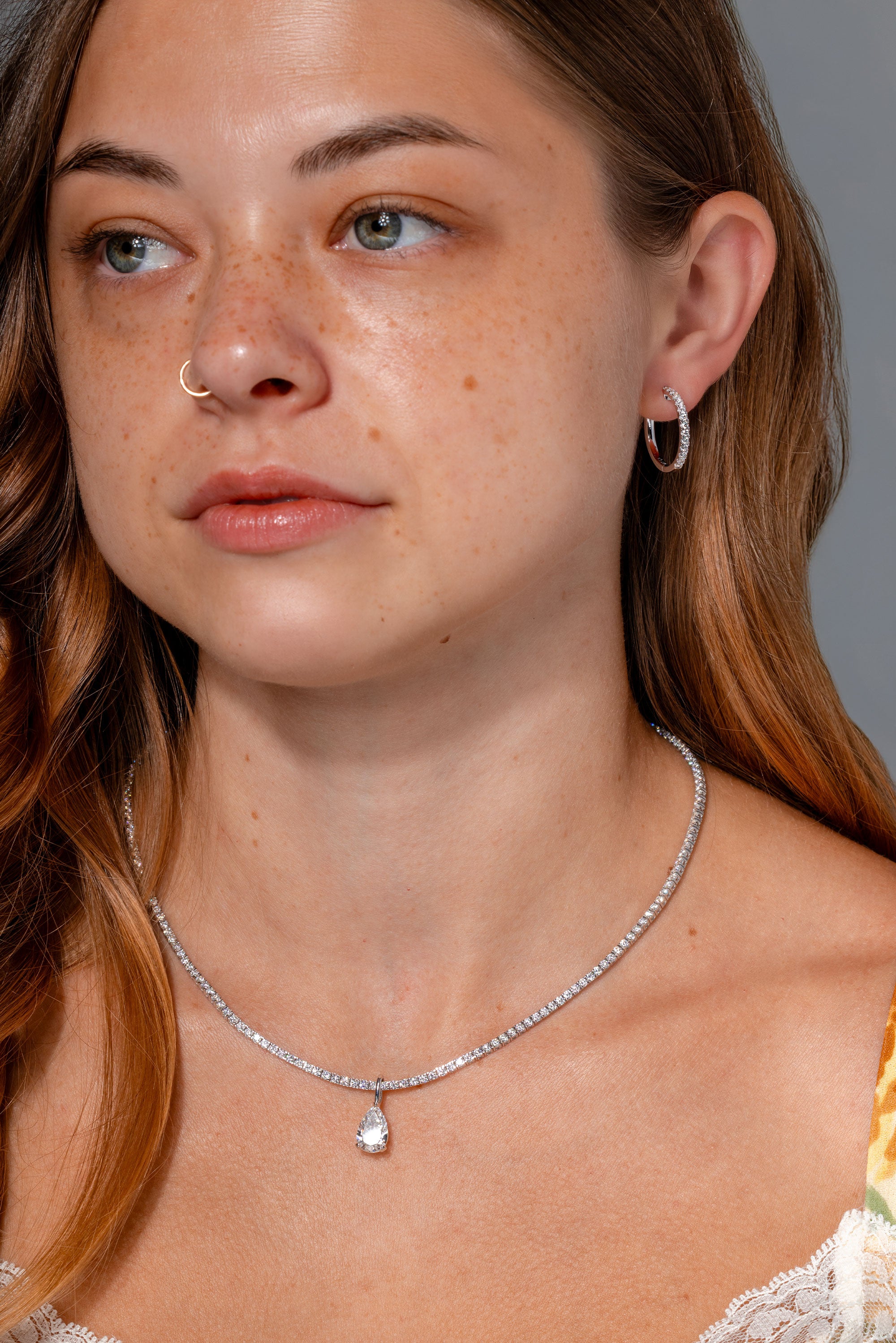 20mm Core Pavé Hoop White Gold on ear