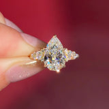 3.03ct D-VVS2 Pear Lab Diamond Brandi.

The Brandi is an inline style engagement ring featuring a symmetrical cluster of side diamonds that create a bold, sculptural look&nbsp;

Because of its inline design, straight wedding bands will not stack flush. This style pairs best with a curved or custom wedding band, or it can be worn beautifully on its own without a wedding band at all&nbsp;

A striking choice for those who love a statement engagement ring with intentional design details.