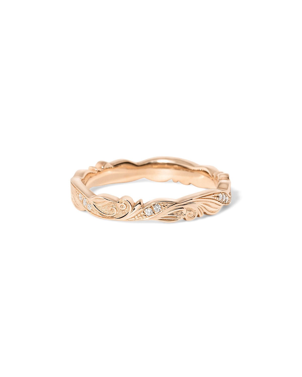 Josephine wedding band with hand-engraved scroll detailing and subtle diamond accents set in gold at Princess Bride Diamonds jewelry store in Orange County