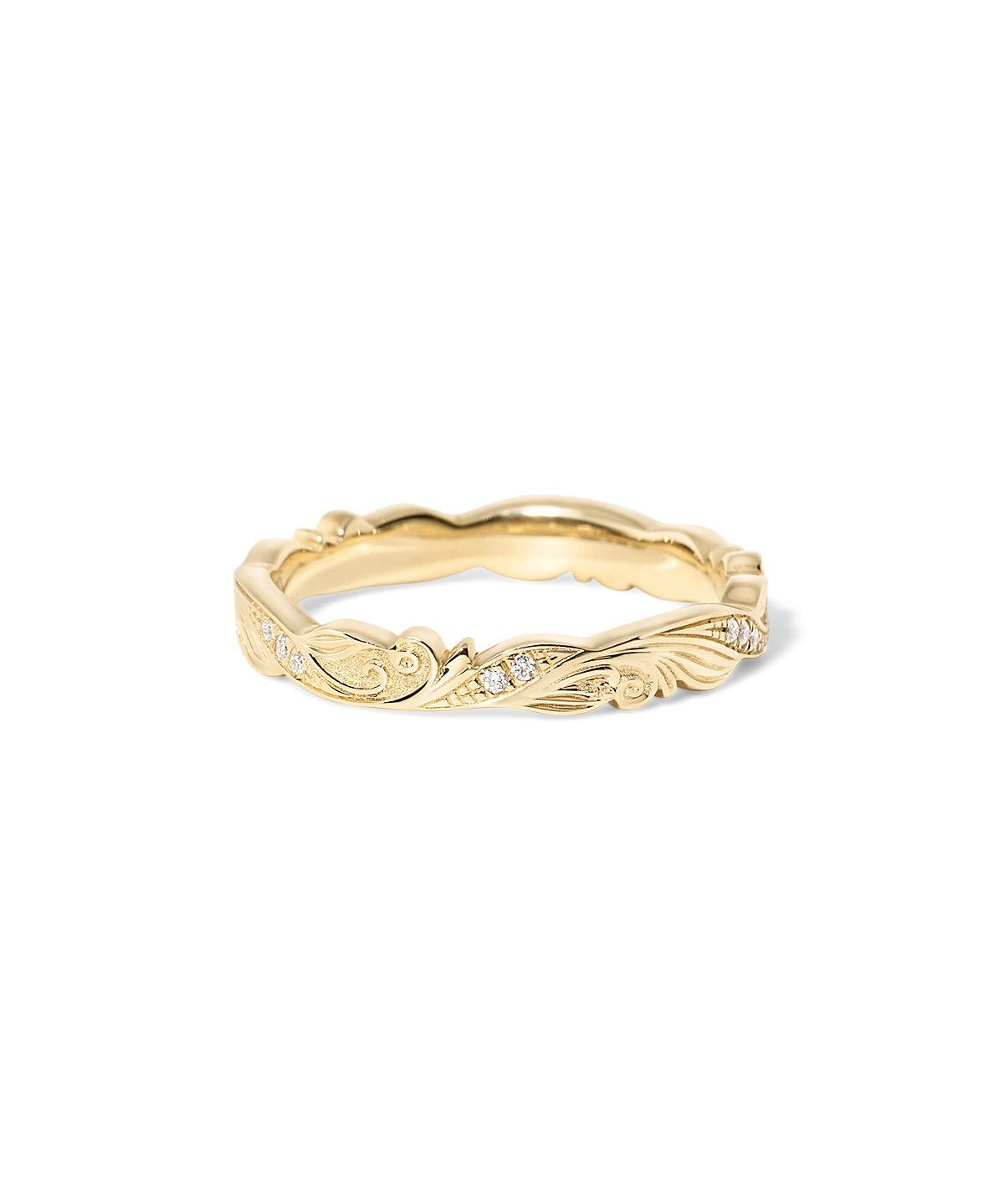 Josephine wedding band with hand-engraved scroll detailing and subtle diamond accents set in gold at Princess Bride Diamonds jewelry store in Orange County