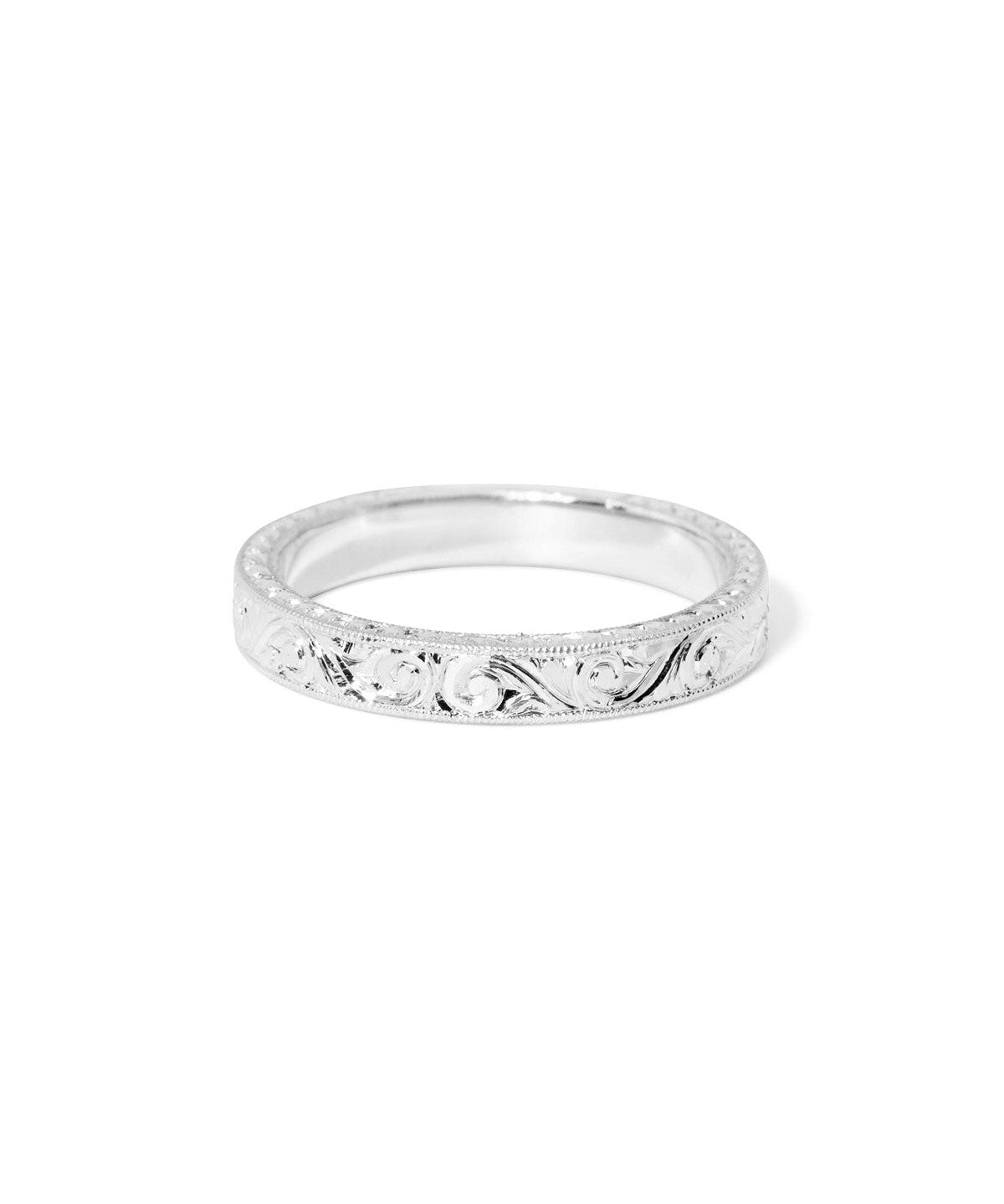 Kai 3mm wedding band with all-over hand-engraved gold texture and vintage-inspired detail at Princess Bride Diamonds jewelry store in Orange County 