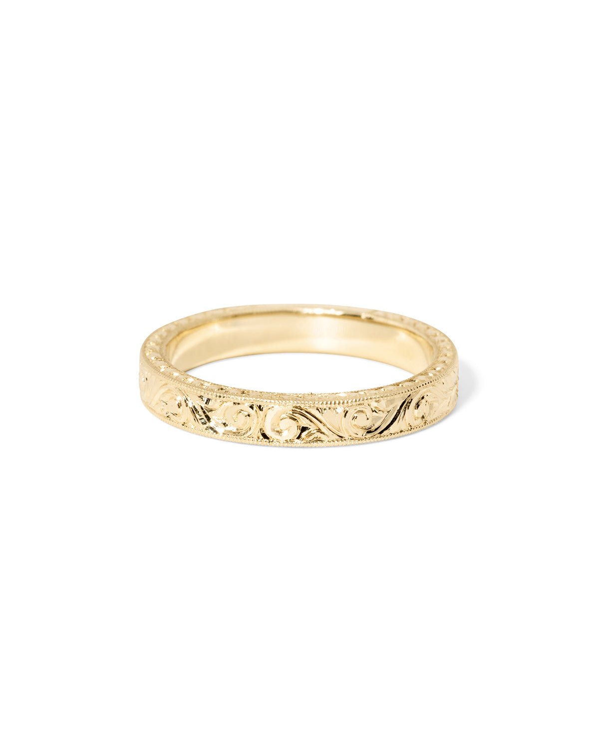 Kai 3mm wedding band with all-over hand-engraved gold texture and vintage-inspired detail at Princess Bride Diamonds jewelry store in Orange County