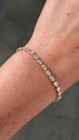 6.46ct East West Pear Tennis Bracelet Yellow Gold
