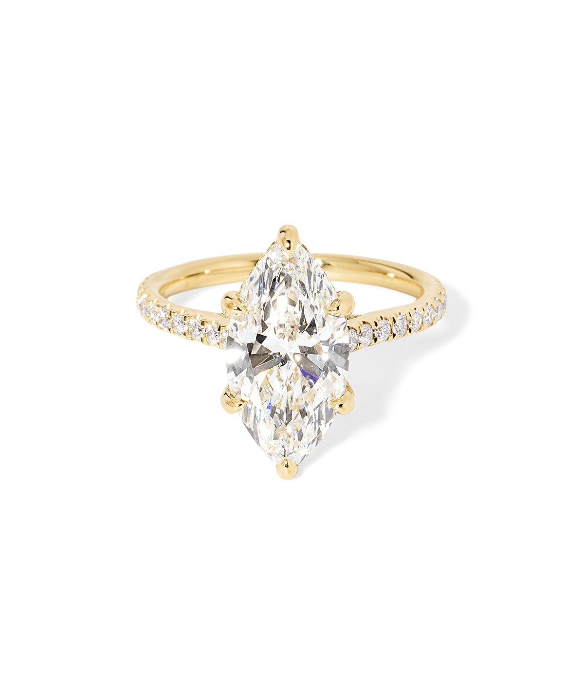 The Alice Marquise lab diamond engagement ring at Princess Bride Diamonds in Huntington Beach, California features a classic pavé diamond band with a cathedral-style setting for a higher, elegant look. It also includes a hidden under-halo beneath the center stone and a diamond bridge for added sparkle from every angle. 14k yellow gold 
