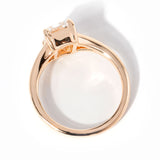 emerald cut diamond on split shank rose gold ring