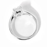 emerald cut diamond on split shank white gold ring