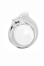 emerald cut diamond on split shank white gold ring