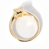 emerald cut diamond on split shank yellow gold ring