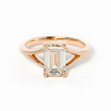 emerald cut diamond on split shank rose gold ring