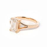 emerald cut diamond on split shank rose gold ring