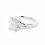 emerald cut diamond on split shank white gold ring