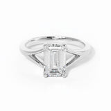emerald cut diamond on split shank white gold ring