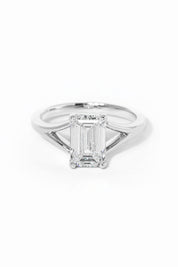 emerald cut diamond on split shank white gold ring