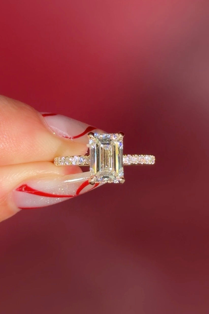 Emerald Cut Lab Diamond Solitaire in Yellow Gold with Pave diamond band and hidden halo