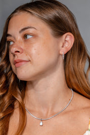 Graduating Floating Diamond Hoops Natural Diamond iat Princess Bride Diamonds Jewelry Store Huntington Beach on model