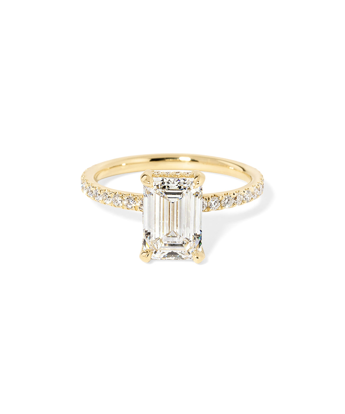 Kayla Emerald Engagement Ring with a diamond hidden halo and classic pave band featuring lab grown diamond side stones in solid yellow gold at princess bride diamonds in huntington beach california 14k yellow gold 