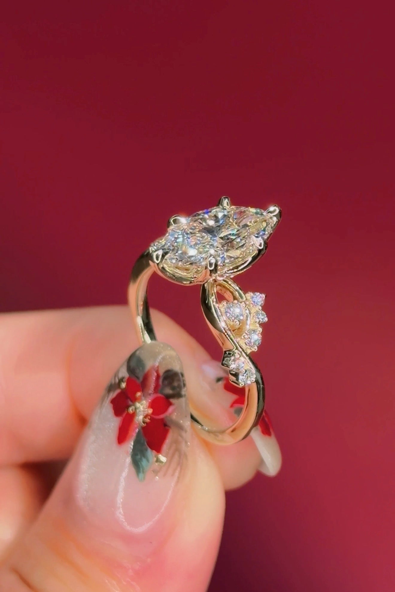 marquise diamond yellow gold engagement ring with alternating side stones