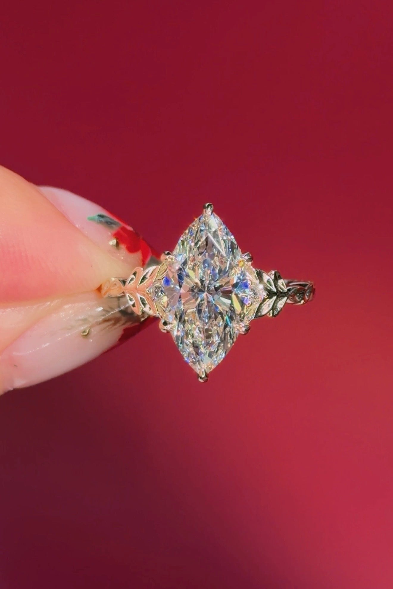 marquise diamond leafy nature inspired yellow gold engagement ring