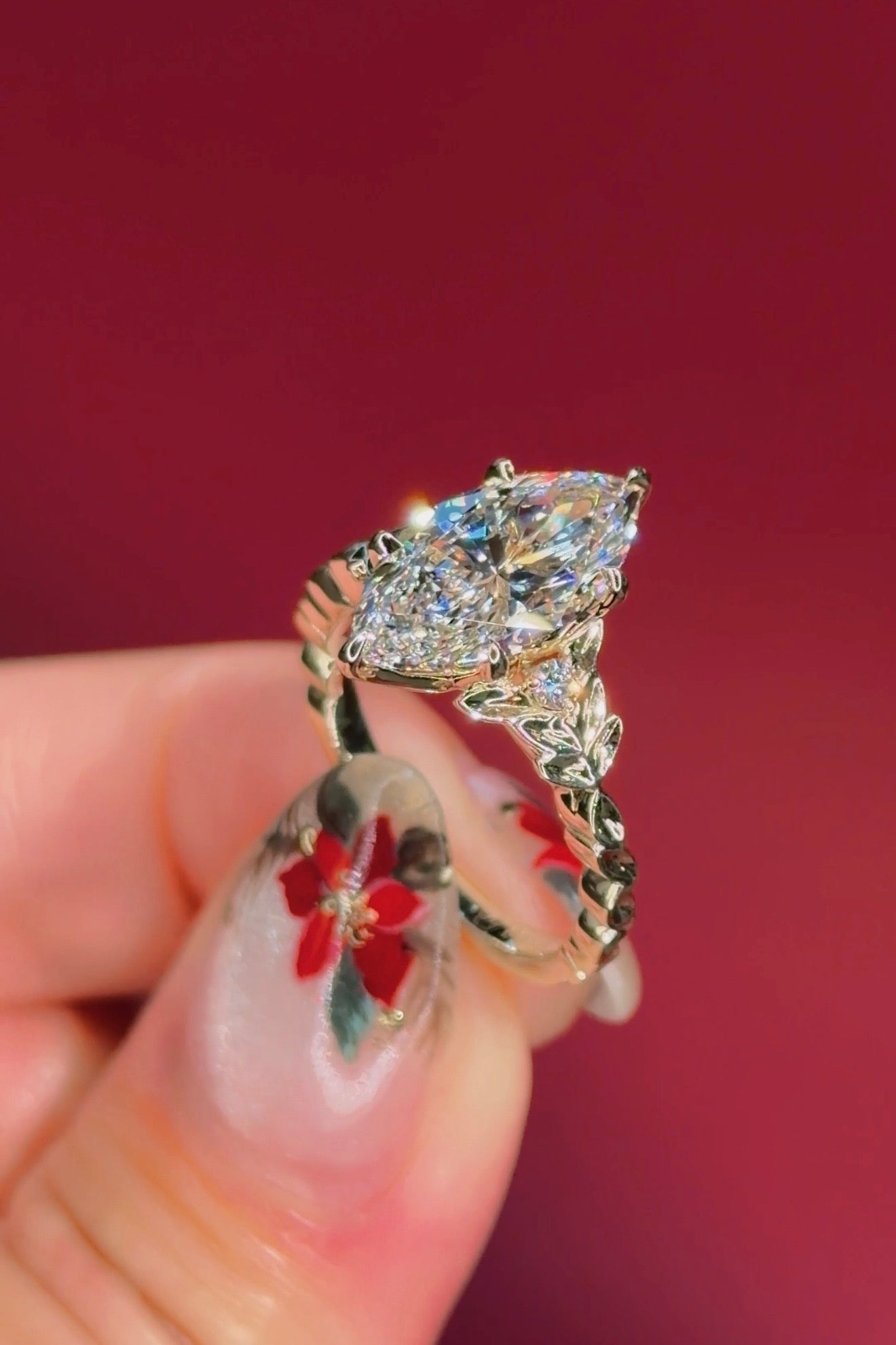 marquise diamond leafy nature inspired yellow gold engagement ring