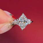 marquise diamond cluster white gold engagement ring