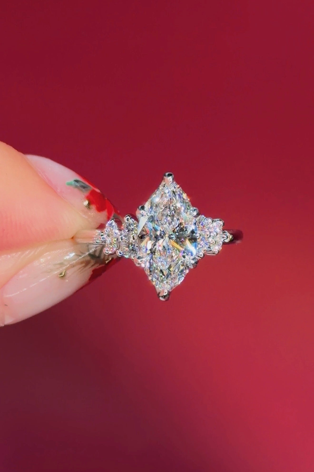 marquise diamond cluster white gold engagement ring