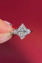 marquise diamond cluster white gold engagement ring