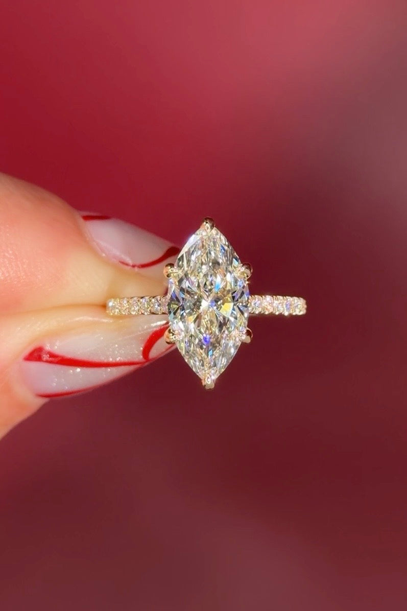 Marquise Solitaire Engagement Ring with Pave Diamond Band in Yellow Gold Cathedral Style with hidden halo