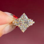 marquise lab diamond engagement ring yellow gold cluster side stones setting