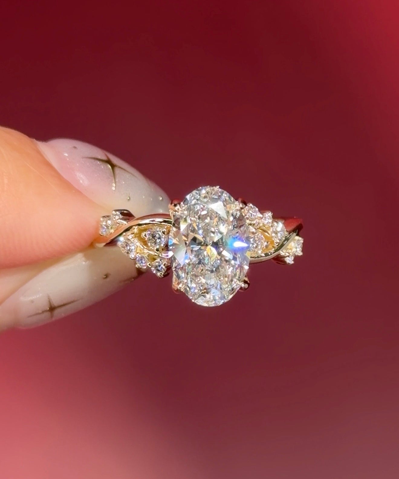 oval lab diamond cluster side stones whimsical yellow gold engagement ring