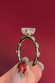 oval floating diamond spaced out band yellow gold engagement ring