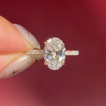 oval lab diamond engagement ring pave band hidden halo yellow gold