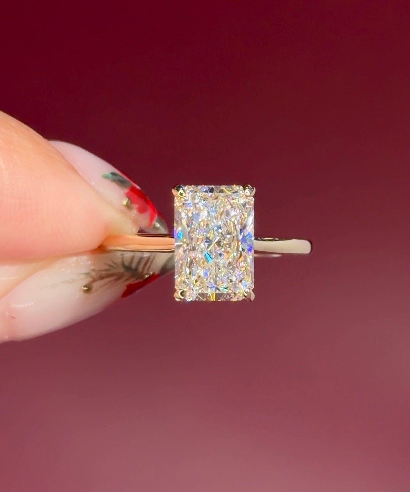 radiant lab diamond yellow gold solitaire engagement ring cathedral setting with diamond bridge