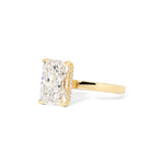 Remi radiant-cut lab grown diamond engagement ring in yellow gold with hidden diamonds on the band and a diamond hidden halo at Princess Bride Diamonds, Huntington Beach, California. 