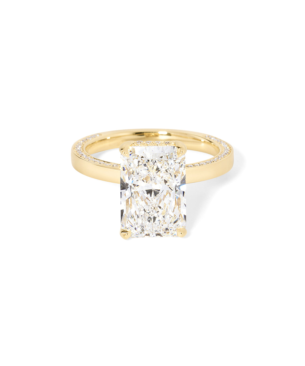 Remi radiant-cut lab grown diamond engagement ring in yellow gold with hidden diamonds on the band and a diamond hidden halo at Princess Bride Diamonds, Huntington Beach, California. 