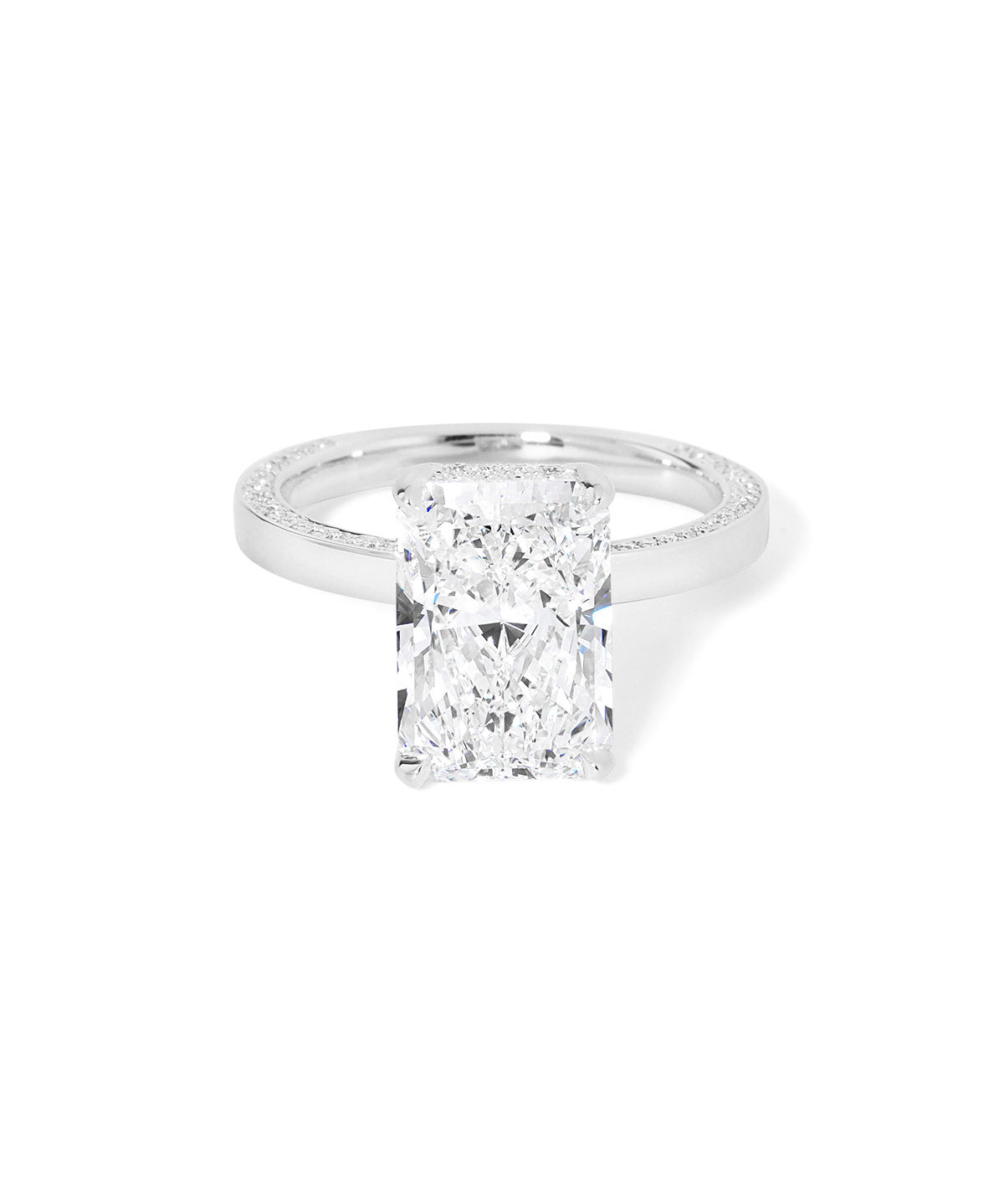 Remi radiant-cut lab grown diamond engagement ring in white gold with hidden diamonds on the band and a diamond hidden halo at Princess Bride Diamonds, Huntington Beach, California. 