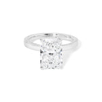 Remi radiant-cut lab grown diamond engagement ring in white gold with hidden diamonds on the band and a diamond hidden halo at Princess Bride Diamonds, Huntington Beach, California. 