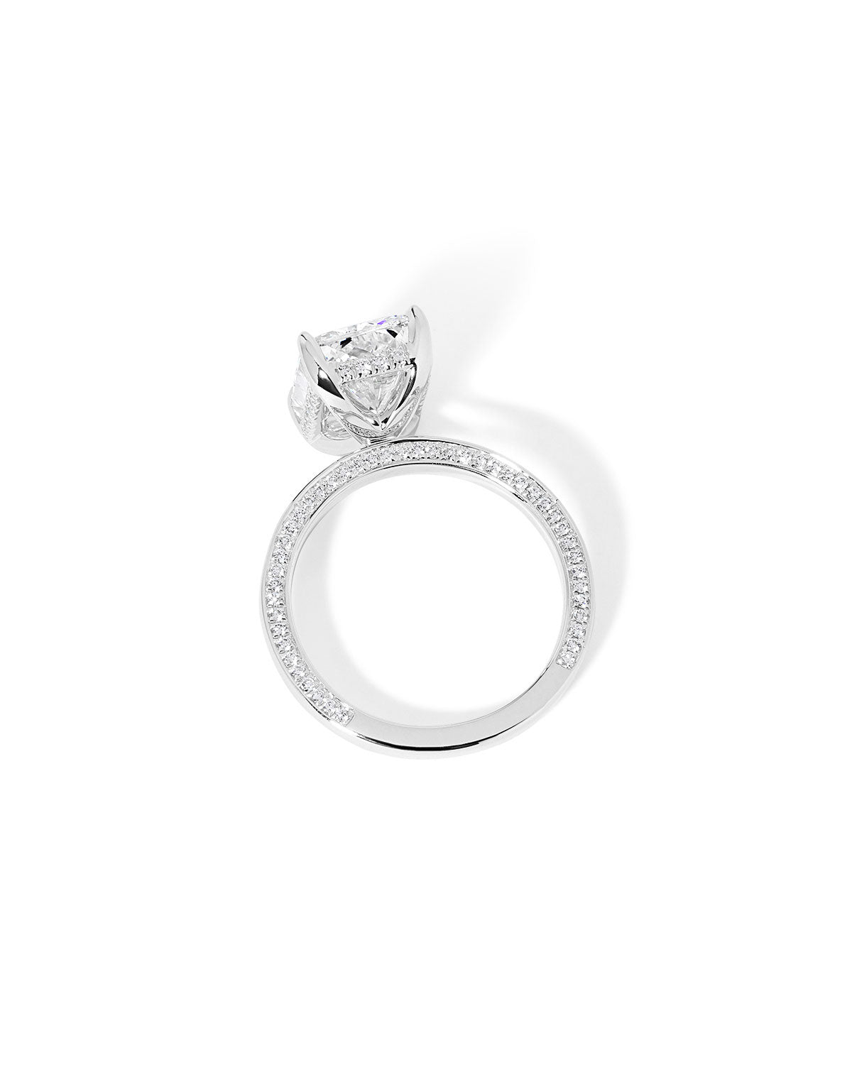 Remi radiant-cut lab grown diamond engagement ring in white gold with hidden diamonds on the band and a diamond hidden halo at Princess Bride Diamonds, Huntington Beach, California. 