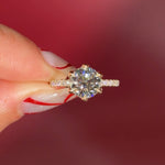 Round Solitaire Engagement Ring with Pavé Side Diamonds in yellow Gold with Petal Prongs