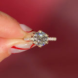 Round Solitaire Engagement Ring with Pavé Side Diamonds in yellow Gold with Petal Prongs