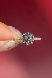 round lab diamond yellow gold engagement ring pavé with cathedral and diamond bridge and diamond prongs