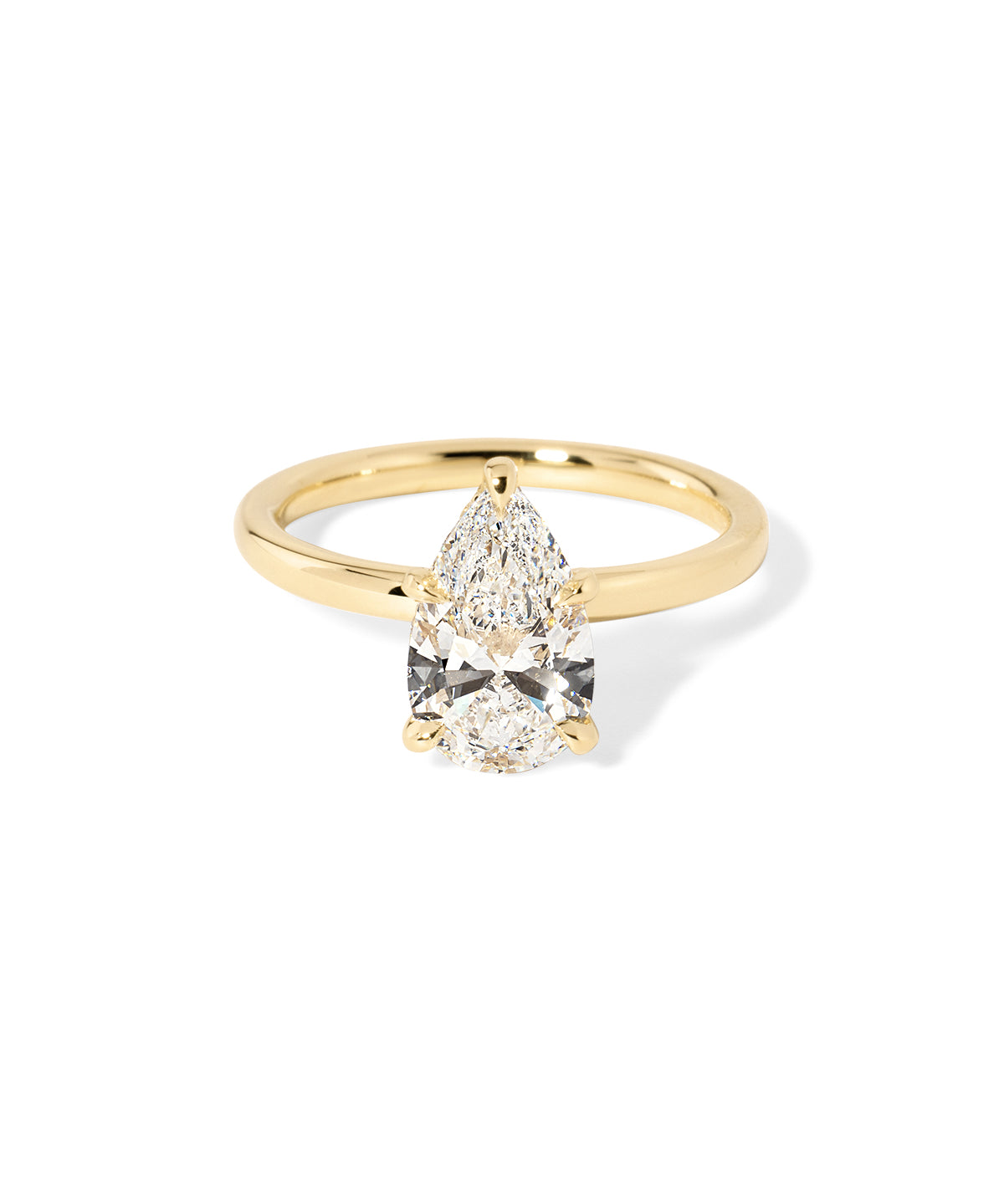 Stephanie Pear engagement ring with a high polish yellow gold band and a under halo with lab diamonds at Princess Bride Diamonds in Huntington Beach California 